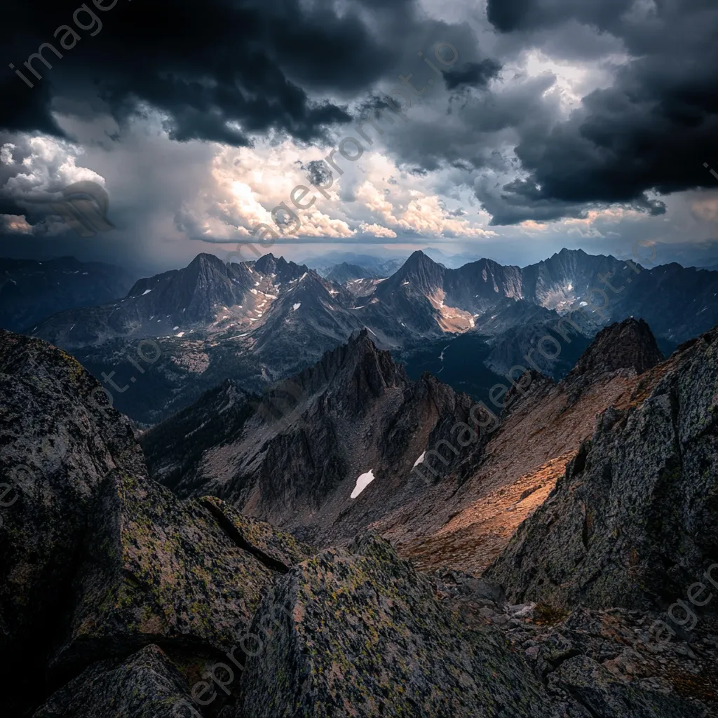 Rocky mountain ridges beneath dark storm clouds - Image 4