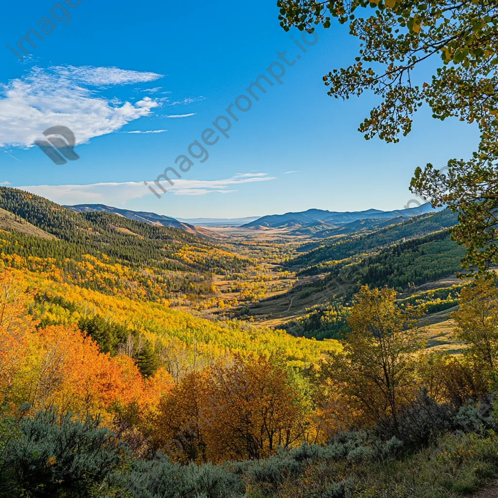 View of a valley rich in autumn colors from a hiking trail under a clear blue sky. - Image 2