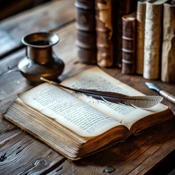 An open book with a quill and ink pot on a wooden table. - Image 3