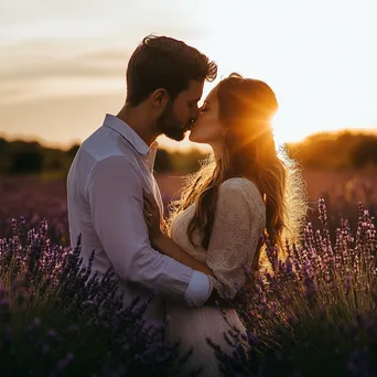 Couple kissing in a lavender field at sunset - Image 3