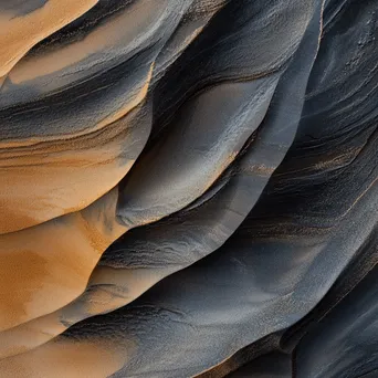 Close-up of wind-created patterns in sand - Image 1