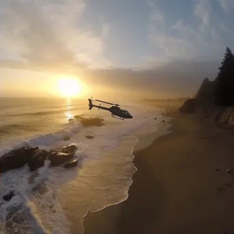 Coastline at sunrise with helicopters patrolling, aerial beach view - Image 2