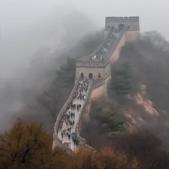 Great Wall of China with tourists walking along the wall - Image 2