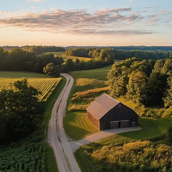 Aerial view of traditional barn in farmland - Image 3