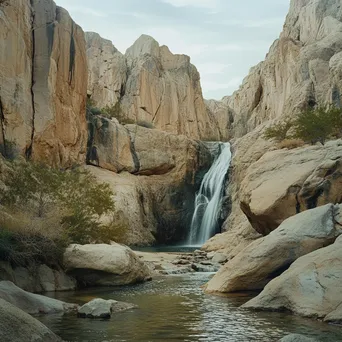 Remote desert oasis with waterfall and wildlife - Image 3