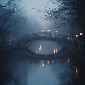 Fog-enshrouded bridge over a river - Image 3