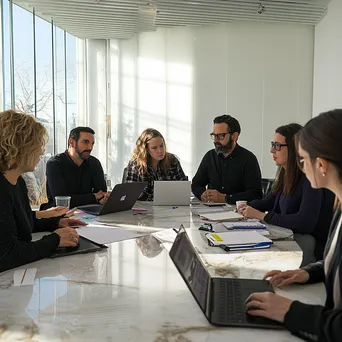 Professionals collaborating over coffee in a conference room - Image 2