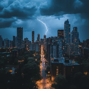 Thunderstorm with rain and lightning over a city skyline. - Image 1