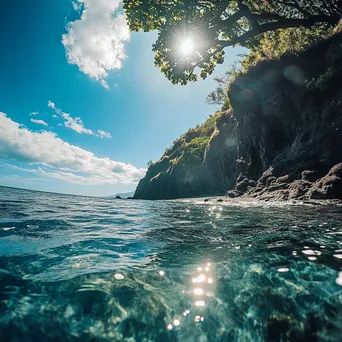 Beautiful volcanic island with tropical vegetation and coastal water - Image 3