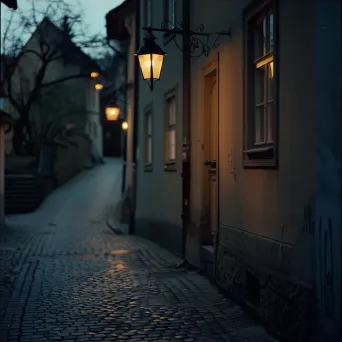 Quiet city back alley with vintage street lamps and warm lighting - Image 3