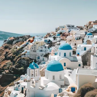 Santorini island with white buildings and blue domes - Image 3