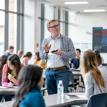 Professor leading a dynamic discussion with engaged students in class. - Image 4