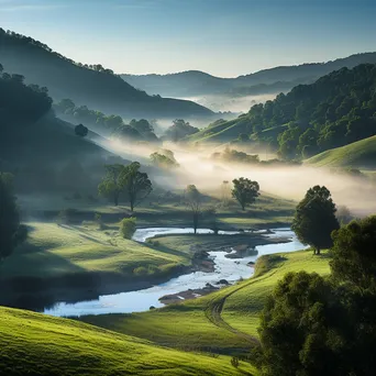 Morning mist covering a valley with rolling hills - Image 4