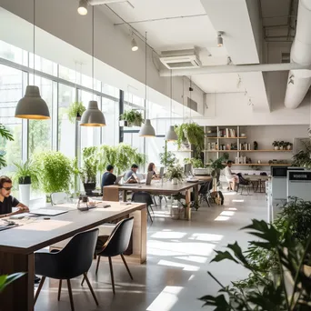 Individuals working in a bright, minimalist co-working space - Image 4