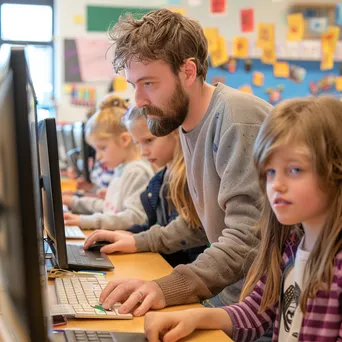 Older student guiding kids in a coding workshop. - Image 2