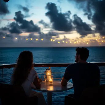 Couples enjoying evening on cruise ship balcony. - Image 1