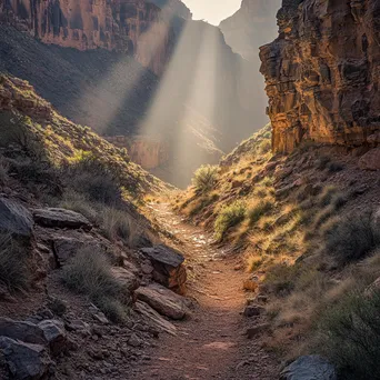 Hiking trail winding through a canyon - Image 1