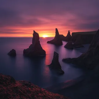 Dramatic Sunset behind Coastal Sea Stacks