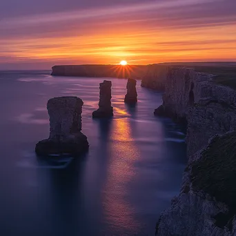 Coastal sea stacks at sunset with vibrant hues - Image 3