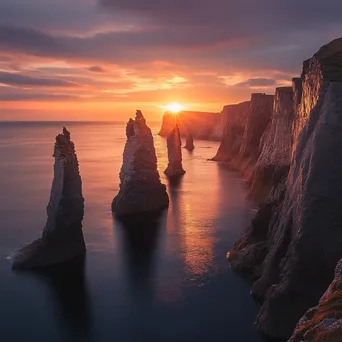 Coastal sea stacks at sunset with vibrant hues - Image 4