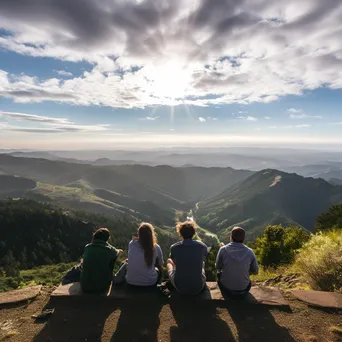 A group of friends relaxing at a scenic overlook - Image 1