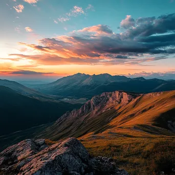 Rugged mountain plateau at sunset with contrasting shadows. - Image 2