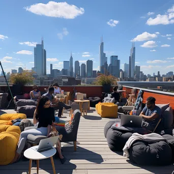 Professionals working on laptops in a rooftop co-working space - Image 1