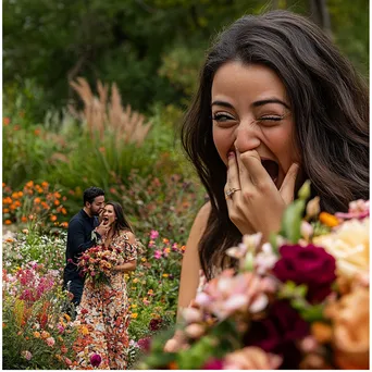 Couple during a surprise proposal in a park - Image 2