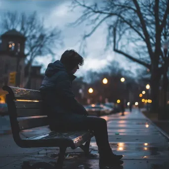 Person alone on bench looking distressed for mental health awareness - Image 3