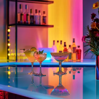 Artistic arrangement of cocktails on a modern bar counter - Image 1