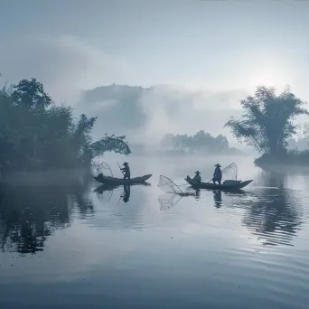 Local fishermen casting nets on the village lake at dawn - Image 3