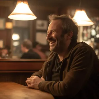 Middle-aged man with a potbelly laughing in a pub under warm lighting - Image 3