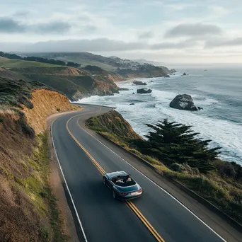 Luxury convertible on a coastal highway - Image 3