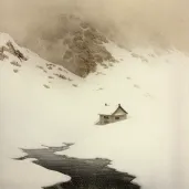 Avalanche descending towards small cabin in snowy mountain - Image 1