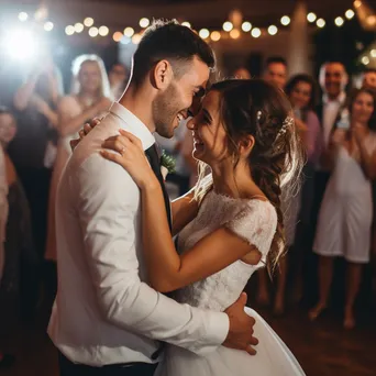 Couple sharing their first dance during wedding celebration. - Image 4