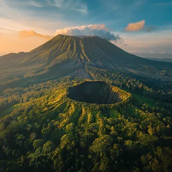 Panoramic shot of a dormant volcano with greenery at golden hour - Image 2