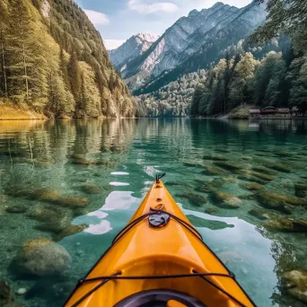 Aerial View of Lake with Kayak and Mountains