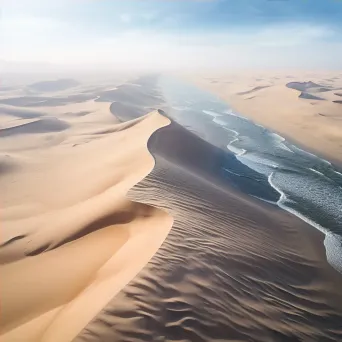 Vast desert with undulating sand dunes resembling ocean waves - Image 4