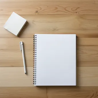 Plain notebook and pencil on a white desk - Image 1