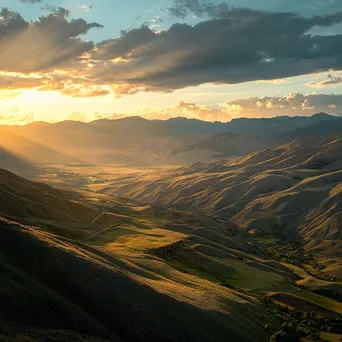 Mountain pass view during golden hour with shadows - Image 1