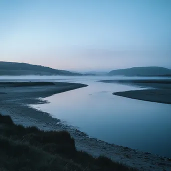 Mist over estuary at dawn where river meets ocean - Image 1