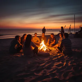 Friends sitting around a beach bonfire at dusk, illuminated by the warm glow of the fire. - Image 3