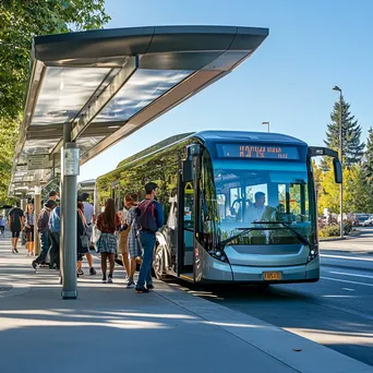 Diverse group of passengers boarding a modern electric bus at a bus stop. - Image 1