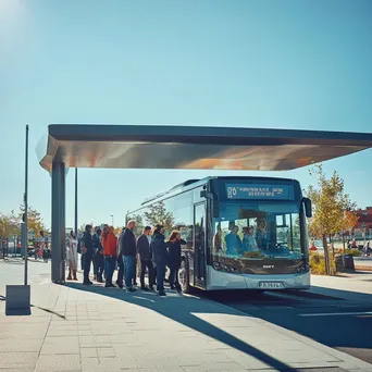 Diverse group of passengers boarding a modern electric bus at a bus stop. - Image 2