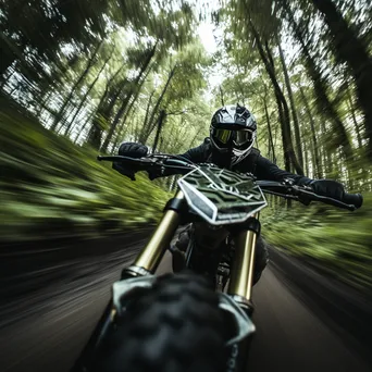 Motorcycle racing through a winding forest trail - Image 4