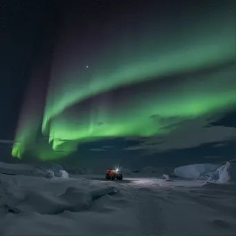 Aurora australis above Antarctic landscape - Image 1