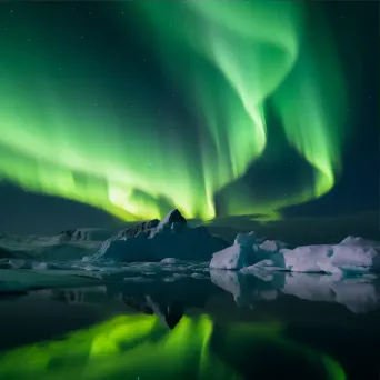 Aurora australis above Antarctic landscape - Image 3