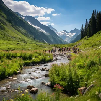 Vibrant mountain stream in flower-filled valley with hikers enjoying the scenery. - Image 4