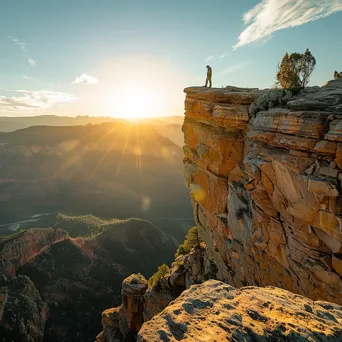 Hiker Overlooking Sunlit Valley