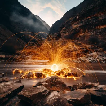 Light trails from spinning steel wool in a canyon landscape. - Image 2